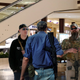 Image for article titled Bystanders Too Busy Complimenting Each Other’s Guns To Stop Mass Shooter